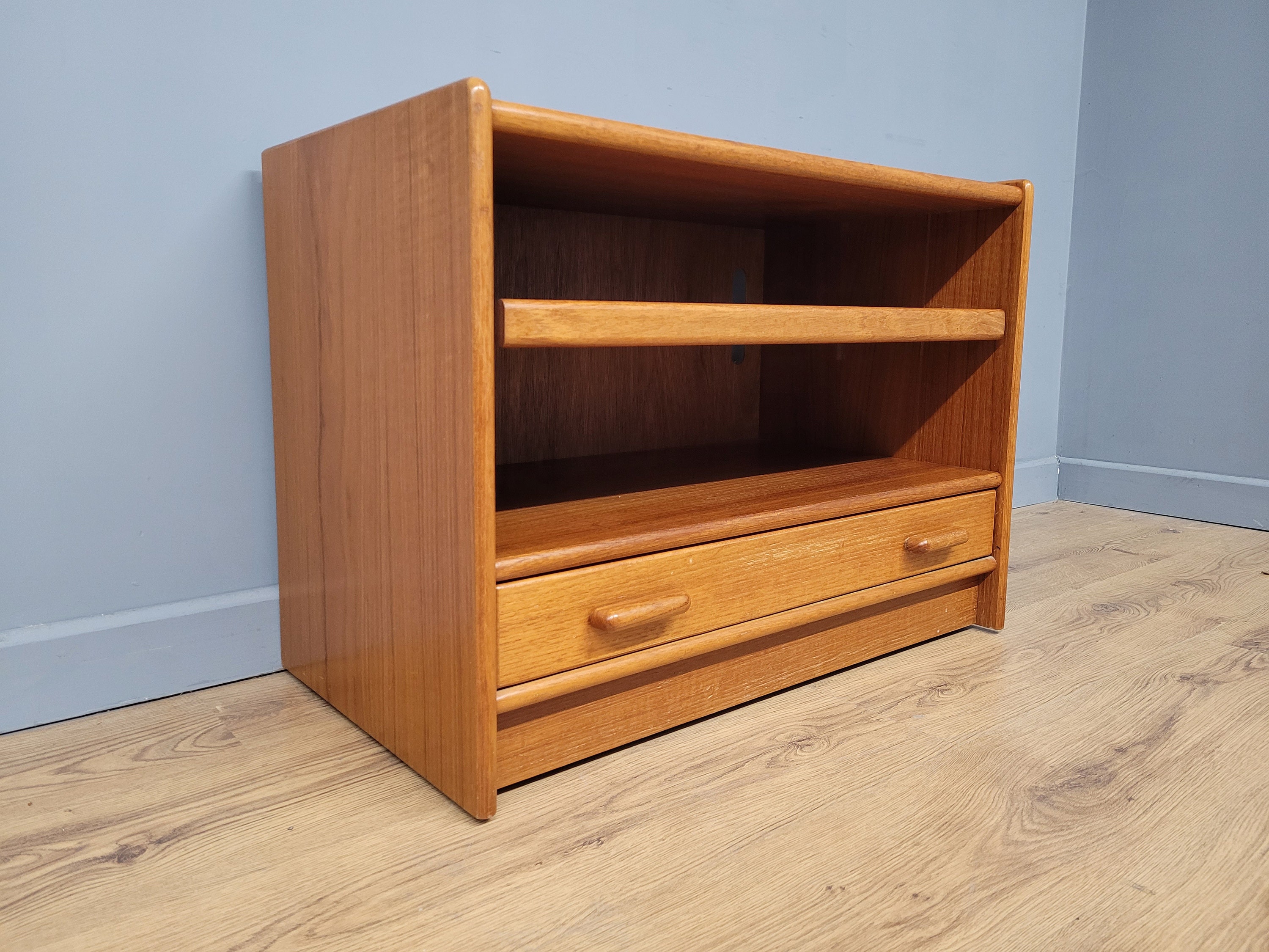 Teak media console outlet