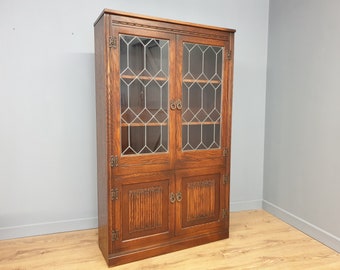 Vintage Wood Bros Old Charm Oak Leaded Glazed Bookcase Cabinet