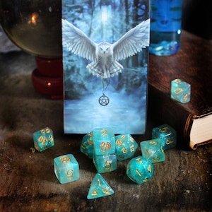 RPG Dice Set of 11 Dice  - Awaken your Magic Artwork by Anne Stokes