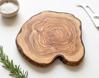 Natural Rustic Olive Wood Cheese Board. Crafted from a single piece of olive tree trunk. Use also as a Trivet or Small Cutting Board
