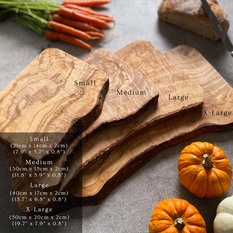 May include: A collection of wooden cutting boards in various sizes, labeled Small, Medium, Large, and X-Large. The boards have a natural wood grain and live edge design. The Small board measures 7.9" x 5.7" x 0.8".