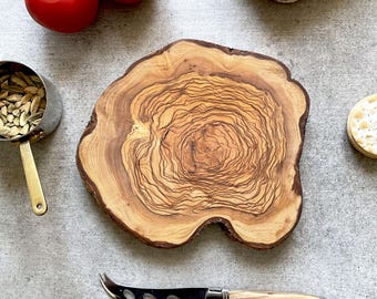 Natural Rustic Olive Wood Cheese Board. Crafted from a single piece of olive tree trunk. Use also as a Trivet or Small Cutting Board
