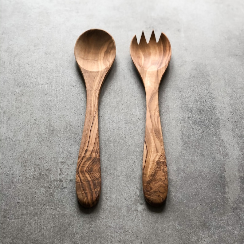 rustic and traditional pair of olive wood salad servers.