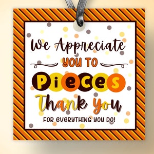 May include: Orange and yellow striped tag with the text "We Appreciate you to Pieces Thank you for everything you do!" with confetti and brown circles.