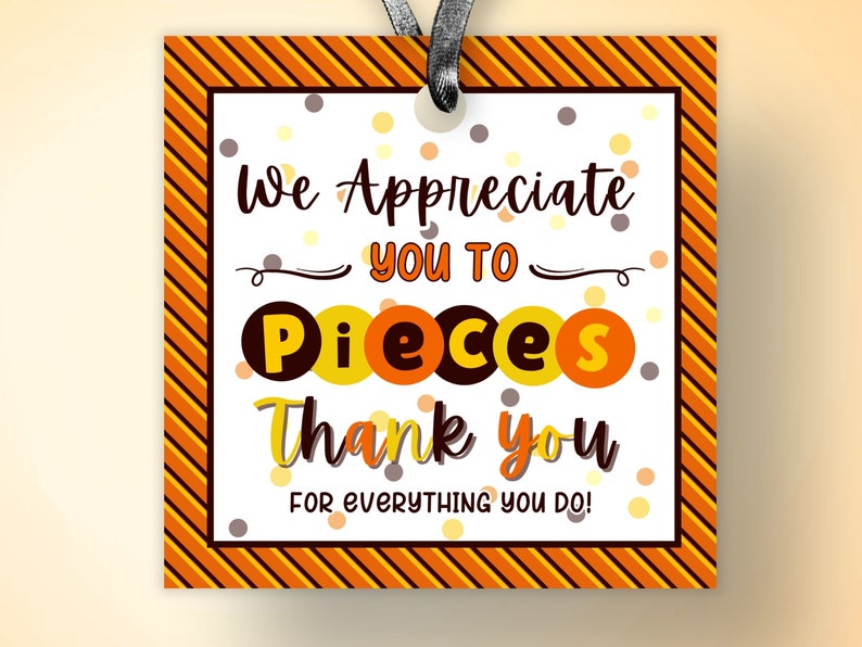 May include: Orange and yellow striped tag with the text "We Appreciate you to Pieces Thank you for everything you do!" with confetti and brown circles.