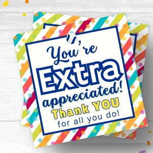 May include: A colorful card with a striped and polka dot pattern. The card says "You're extra appreciated! Thank you for all you do!"