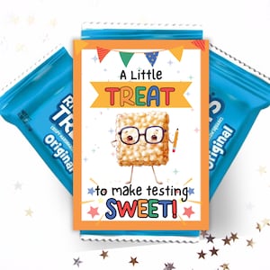 May include: A colorful card with a cartoon rice crispy treat wearing glasses and holding a pencil. The card says "A Little Treat to Make Testing Sweet!"