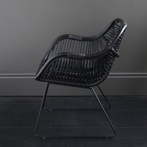 Black seat and Black Metal Legs with Two low arms Rattan Conor Accent Chair