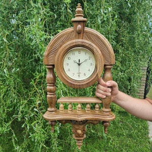 walnut wall clock made to look like an antique