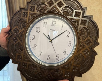 round wooden wall clock carved by hand