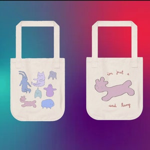 sad lumps -- organic cotton tote bag (featuring leaping lump)