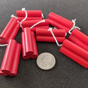 Wooden dynamite with string fuse