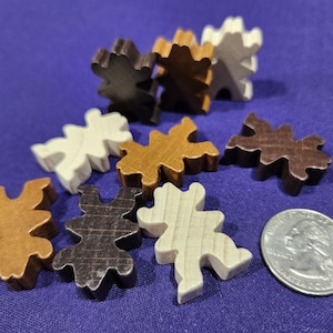 Wooden cowboy game pieces.