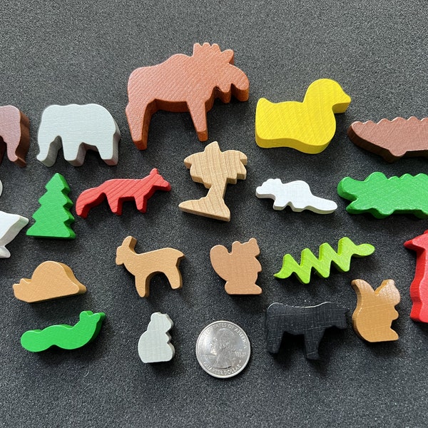 Various wooden animal and tree pieces crocodile