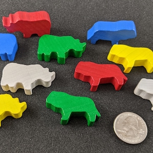Lion and Rino board game pieces