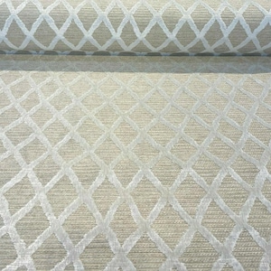 May include: Beige fabric with a white diamond pattern. The fabric has a subtle texture.