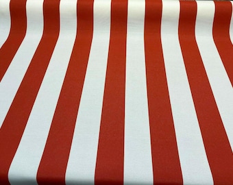 May include: Red and white striped fabric with a diagonal pattern. The fabric is folded in half and the stripes are evenly spaced.