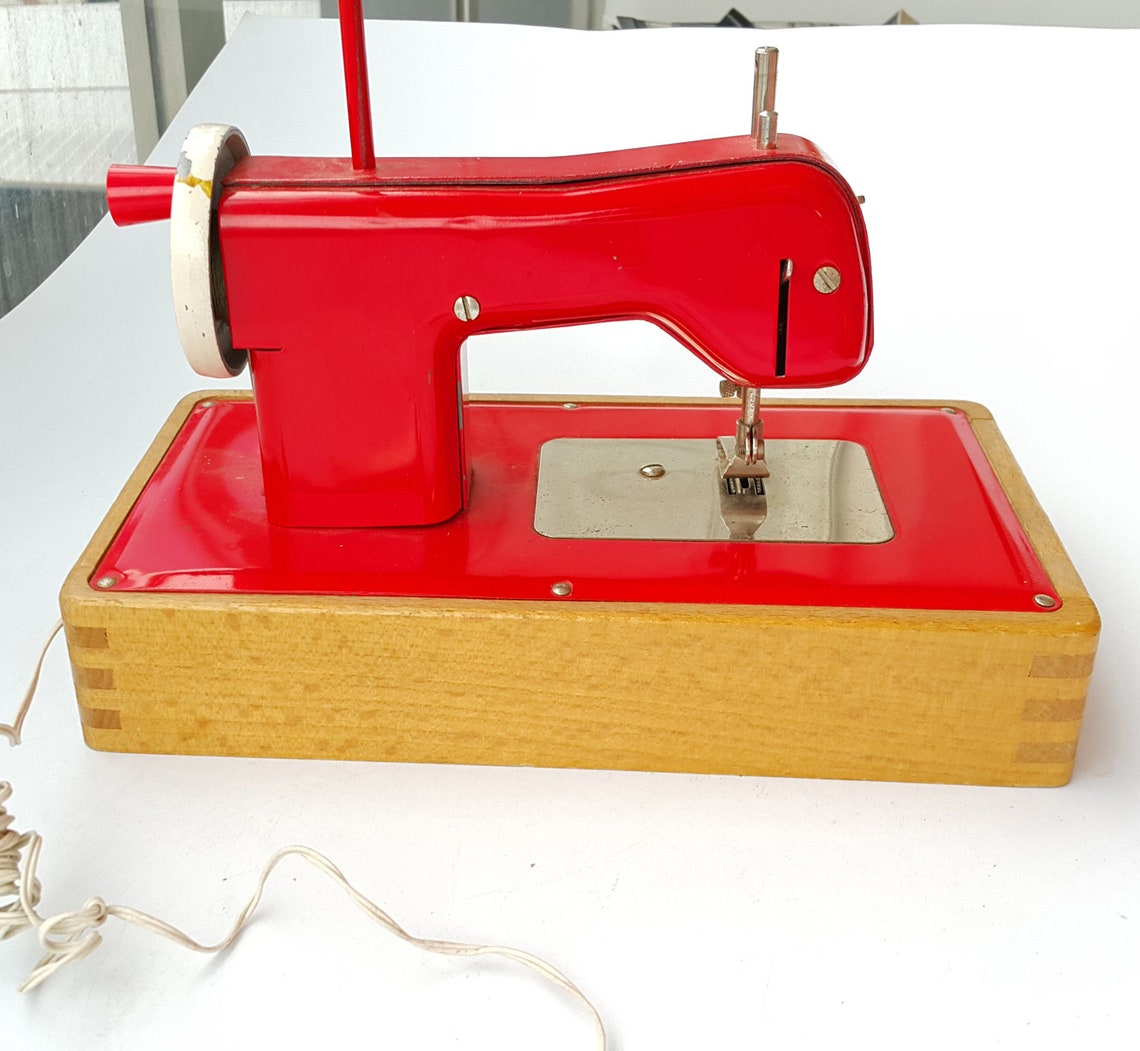 Vintage toy sewing machine with original pedal Regina German Etsy