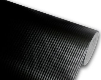 May include: Black carbon fiber vinyl sheet rolled up. The sheet has a textured surface with a woven pattern.