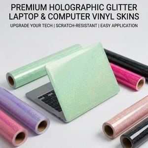May include: A laptop with a light green holographic glitter vinyl skin, surrounded by several rolls of holographic glitter vinyl in various colors including pink, purple, black, and peach. Text reads: PREMIUM HOLOGRAPHIC GLITTER LAPTOP & COMPUTER VINYL SKINS.