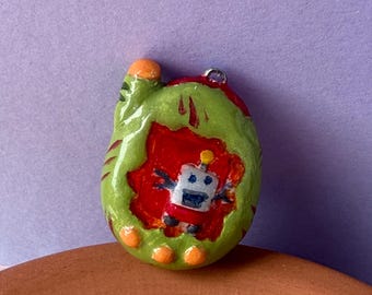 Mean Green Tamagotchi Charm – Handmade Digital Pet Keychain