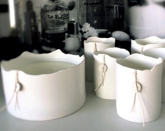 handcrafted scented candle in a ceramic jar