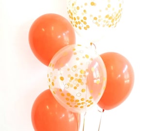 11" Coral and clear gold confetti balloons. Coral and gold. Coral balloons. Gold confetti balloons. Coral and gold balloons. Coral latex
