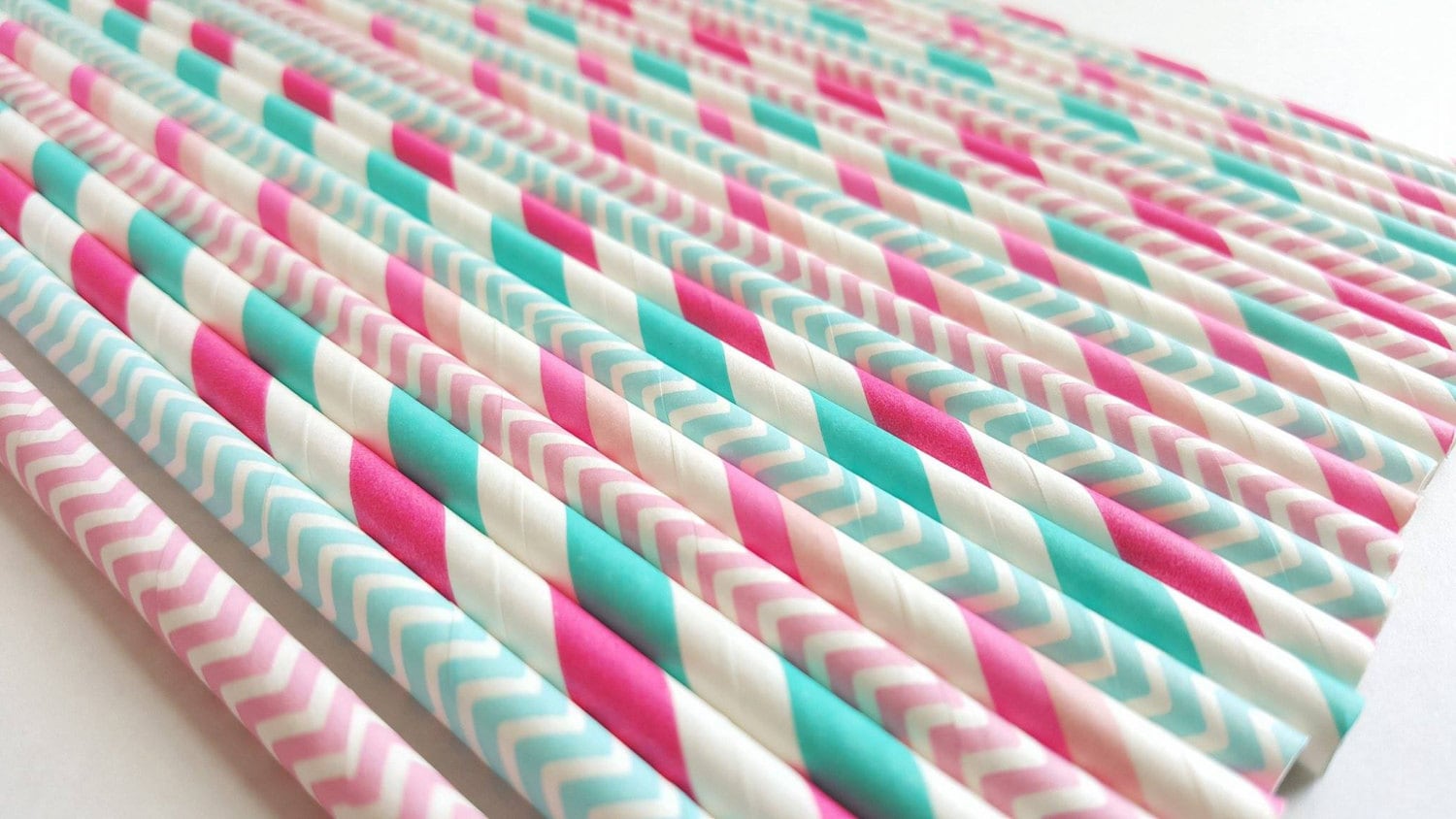 Four Drinking Straw Pink Blue Yellow Green Striped Stock Photo