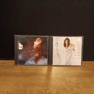 Set of 2 Vintage 90s Gloria Estefan CDs