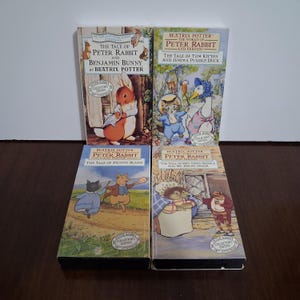 May include: Four VHS tapes from The World of Peter Rabbit and Friends series by Beatrix Potter. Titles include The Tale of Peter Rabbit and Benjamin Bunny, The Tale of Tom Kitten and Jemima Puddle Duck, The Tale of Pigling Bland, and Mrs. Tiggy-Winkle.