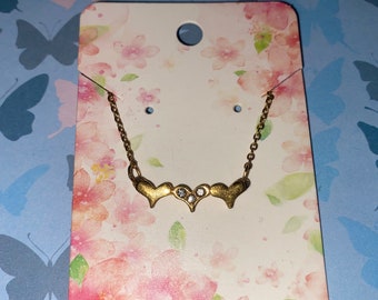 Lindo collar de tres corazones