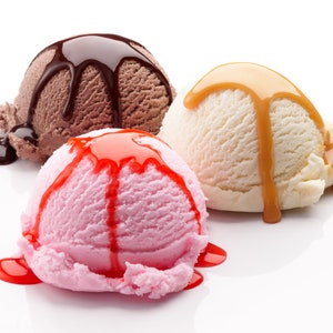 May include: Three scoops of ice cream, one chocolate with chocolate sauce, one vanilla with caramel sauce, and one strawberry with strawberry sauce.