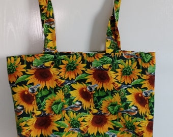 Reversible handmade tote bag, market bag. One side has sunflowers and birds. The other side has cornucopia's, bright sunflowers and pumpkins