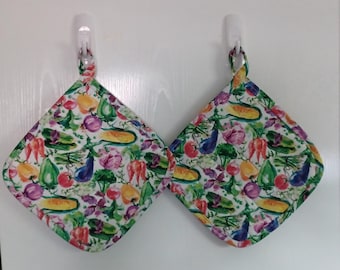 Set of 2 large handmade colorful quilted potholders,  with a variety of garden vegetables. Great for anyone who loves to garden.