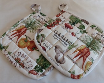 Set of 2 large handmade quilted veggie potholders, made with cotton duck cloth. Will make a nice gift or addition to any home.