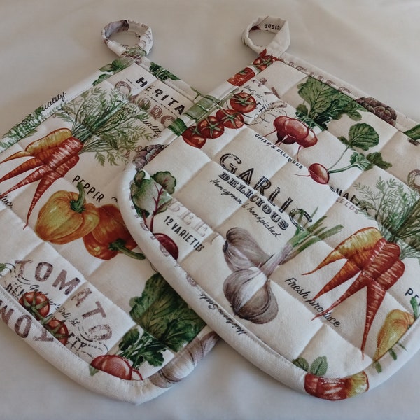 Set of 2 large handmade quilted veggie potholders, made with cotton duck cloth. Will make a nice gift or addition to any home.