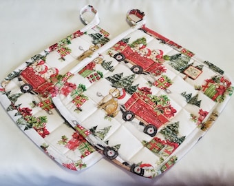 Two large handmade quilted holiday winter scene potholders with adorable puppies. Great for Christmas hostess gift, anyone who loves puppies