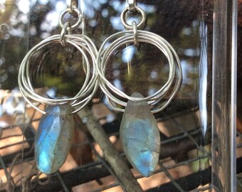 Modern Circle earrings. Sterling silver circles with blue flash labradorite marquis drops. Handmade sterling silver gemstone earrings.