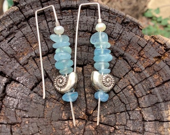 Soft blue aquamarine nugget, silver nautilus earrings. Simple aquamarine stick earrings with modern ‘hairpin’ sterling silver wire hooks