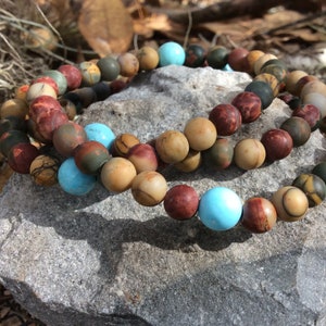 24 inches of Natural red creek jasper & real turquoise wrap stretch bracelet for men. Handmade Picasso jasper and turquoise bracelet.