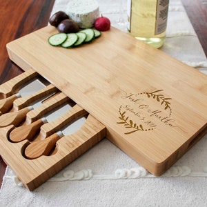 This personalized bamboo cheese board set is an ideal gift for weddings, bridal showers, engagements, and housewarming parties. 

Dimension: 15.75 x 7.75 

The set consists of:
•	a wooden board 
•	a cheese fork;
•	3 cheese knives.