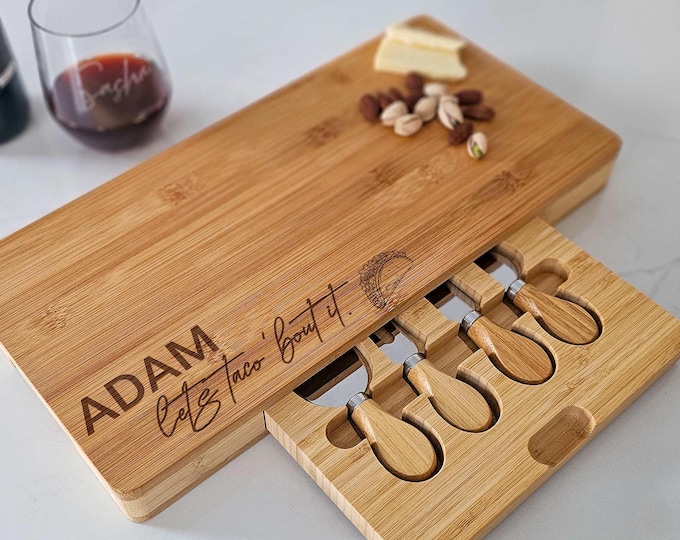 Personalized cheese board: Custom engraved charcuterie board featuring 'Let’s Taco ’Bout It' – a unique gift for foodies.