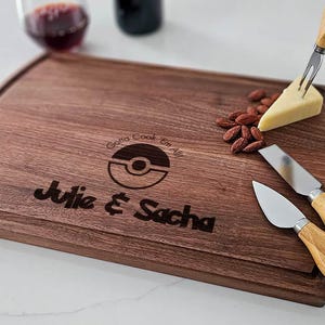 Stylish kitchen scene displaying a personalized Pokémon cutting board as a fun and unique decor accent, perfect for gamer couples.