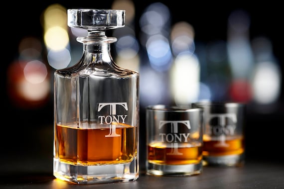 257 favorites don't lie — this monogrammed whiskey decanter set has real demand as a groomsmen or housewarming gift that actually looks handsome on a bar cart.