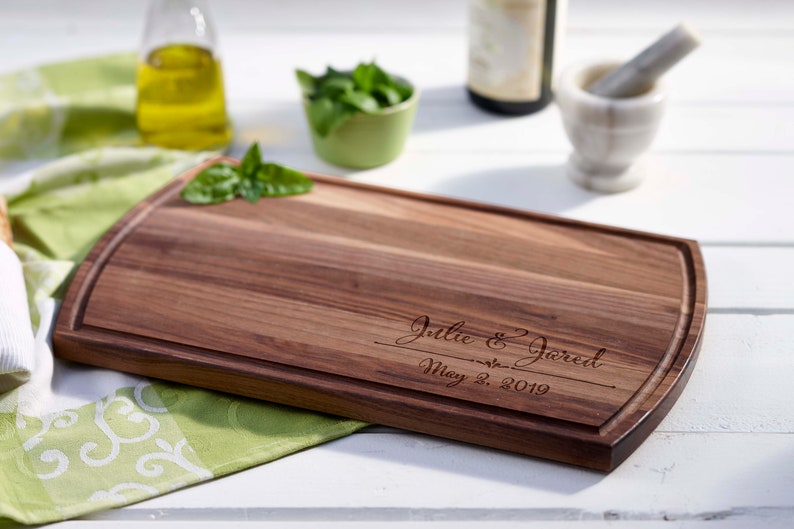 Custom engraved cutting board for the couple, Arched walnut 16x10 in