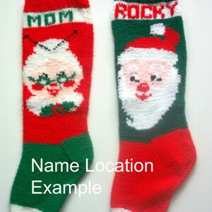 May include: Two knitted Christmas stockings, one red with green trim and the name "MOM" on it, and the other red with green trim and the name "ROCKY" on it. Both stockings feature a white knitted Santa Claus face.