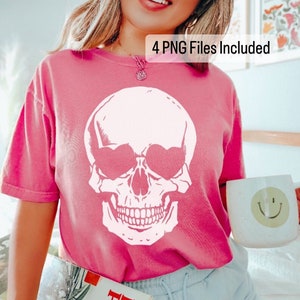 May include: A pink t-shirt with a white skull graphic featuring heart-shaped eyes. The text "4 PNG Files Included" is visible in the top right corner of the image.