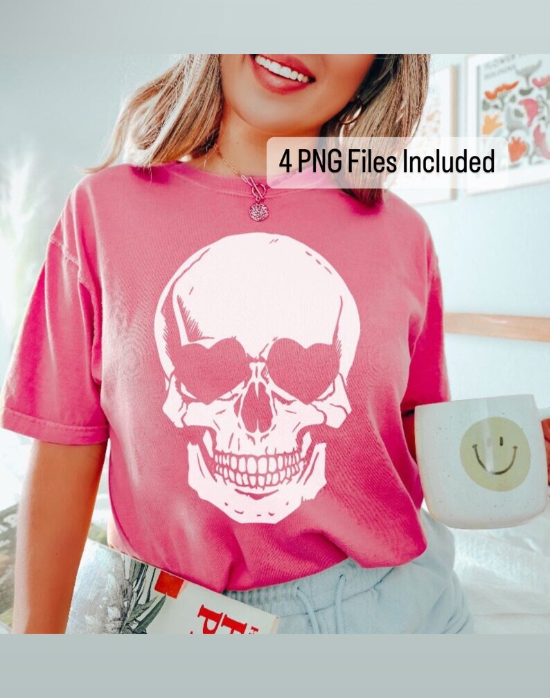May include: A pink t-shirt with a white skull graphic featuring heart-shaped eyes. The text "4 PNG Files Included" is visible in the top right corner of the image.