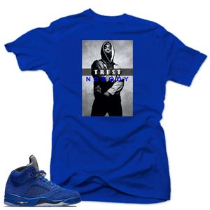 Shirt to match Air Jordan Retro 5 Blue Suede Sneakers.Trust NoBody Royal tee