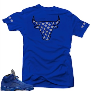 Shirt to match Air Jordan Retro 5 Blue Suede Sneakers.Bull 5 Royal tee